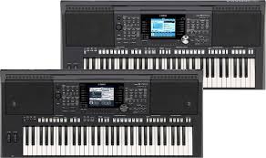 The PSR-S970 is the flagship model of the S-series, and combines all the functionality of the other models in the range together with powerful performance features including versatile effects inherited from the legendary Tyros 5, external display capability and a programmable vocal harmony function.
989 Voices, including Super Articulation Voices, Organ Flutes! Voices. 41 Drum/SFX kits, and 480 XG voices
2 Live Controllers for dynamic real-time control assignable to any combination of parameters including filter, arpeggio and more
450 Styles, including all-new DJ styles, and 40 Audio Styles
Vocal Harmony 2 and Synth Vocoder functions
Mic/Guitar input for use when singing or collaborating with other performers
New Arpeggio function for instant access to a library of arpeggiated synth phrases and more
Authentic Voices and Styles from around the world
USB audio playback with time stretch, pitch shift, and vocal cancel functions
External display capability
Real Distortion and Real Reverb, with an intuitive effects interface
The PSR-S970 features two assignable live controllers, a modulation wheel and two assignable foot pedal inputs, ensuring that you have total control over voices, styles, effects and other functions during live performance.
Also, DJ Styles are a new live...