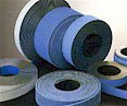 Flat belts are made of non-woven (needled) polyester and impregnated with a special rubber Latex. This provides excellent resistance to abrasion and cutting, low noise and minimal stretch when sized and tensioned properly. The material also has very good resistance to oils, fats and chemical agents.
1.Covers provide friction to drive the material into the bale plus protect the carcass (plies and skims). No matter what product you are transporting or using belt for, exposed plies will dramatically shorten belt life.
2.Skim Coats are the critical thin bonding layers of material and adhesive that are applied between the Plies to bond the Plies together. Skim Coats that do not perform perfectly with the flex and resiliency characteristics of the Plies result in premature belt failure. Exceptional belt life performance in the field under extreme baling conditions comes from a perfect engineered bond created at exactly the right temperature, pressure, tension, and time.