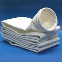 The conventional dust collector filter bags are manufactured using “non woven needlefelt media”. The fibres of the base material, with the support scrim in the middle is passed through a high speed needle-loom. The specially designed needles punch the fibres and interlock them on the support scrim. The material is then calandered and singed to give an aesthetic surface finish. The result is a stable textile material having air permeability suitable for dry dust filtration. MMP is one of the oldest and largest manufacturers of the dust collector bags in India. These bags are manufactured in the state of art stitching facility at