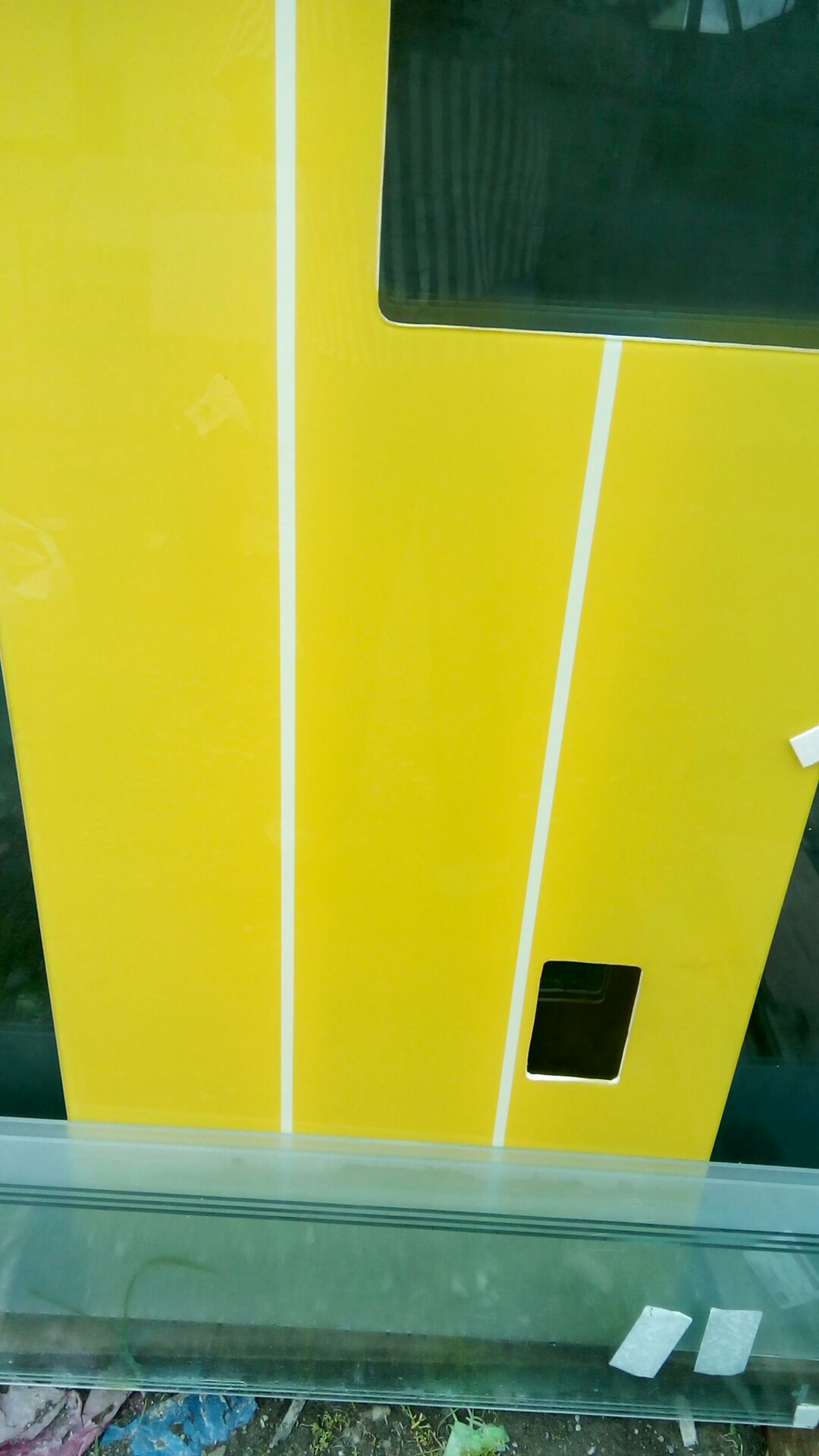lacquered glass can be made of any shade and can be used for wall paneling and as table tops