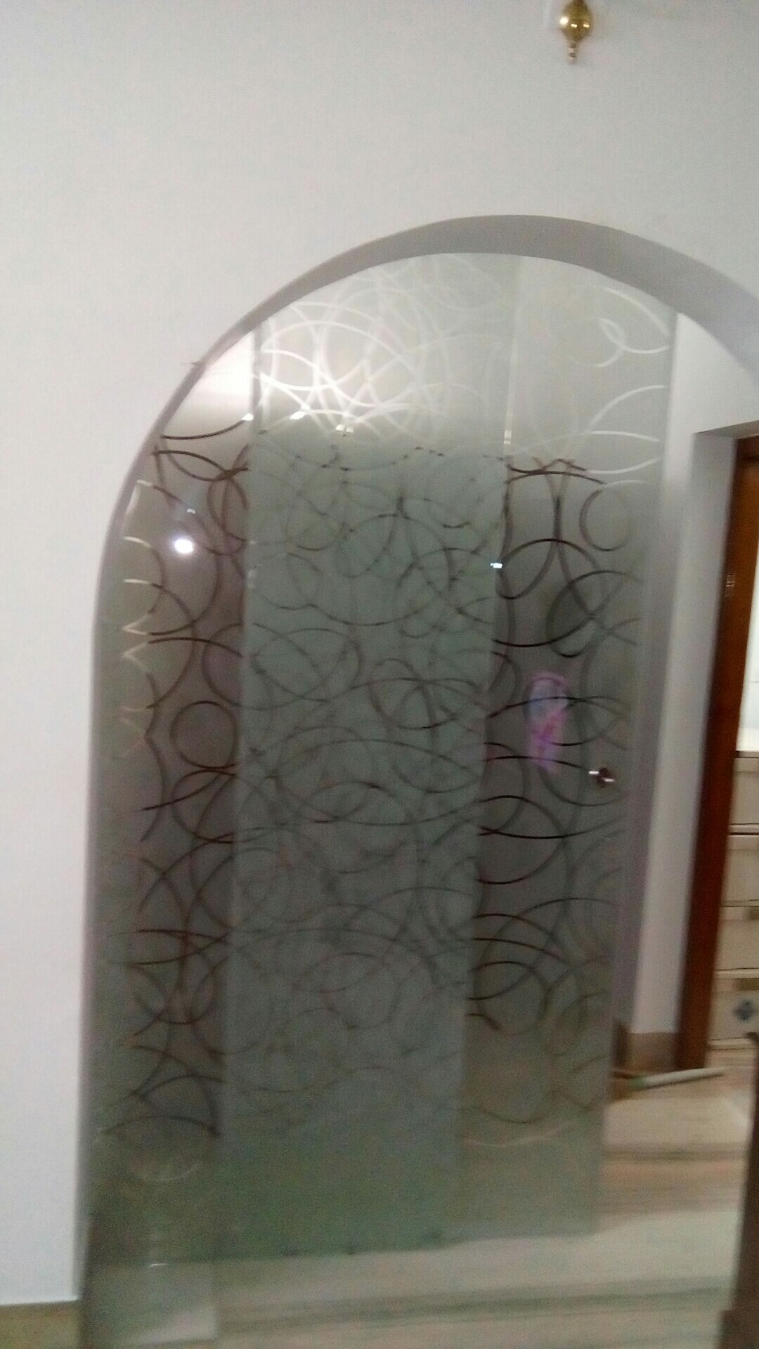 sliding doors can be made of frameless toughened glass in situations when there is no enough space to accommodate swing doors