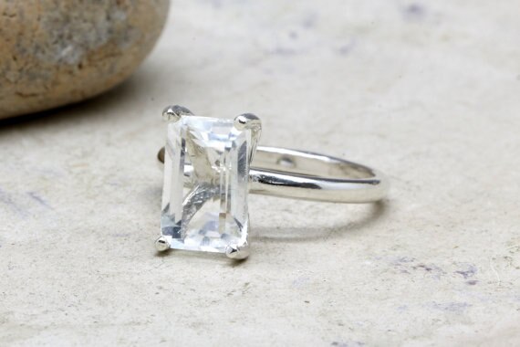 Prong Set Rectangle Crystal Quartz Ring For Women/Prong Set Rechteck Kristall Quarz Ring für Frauen/Prong Set Rectangle Crystal Quartz Ring pour femmes
With a goal to give greatest fulfillment to our customers, we offer the best quality combination of Crystal Quartz Prong Set Ring. These ring are outlined by our talented experts utilising quality-tried fundamental materials with magnificent gold plating. Offered earrings are generally worn amid different gatherings, relational unions, celebrations and different events to get satisfying look. Moreover, these Crystal Quartz Prong Set Ring are accessible with us in various styles, outlines, sizes and shapes at sensible costs.
Product Details :
Gemstone - Crystal Quartz
Gemstone Size - 7 X 11 mm
Shape - Rectangle
Size - Can be done in all.