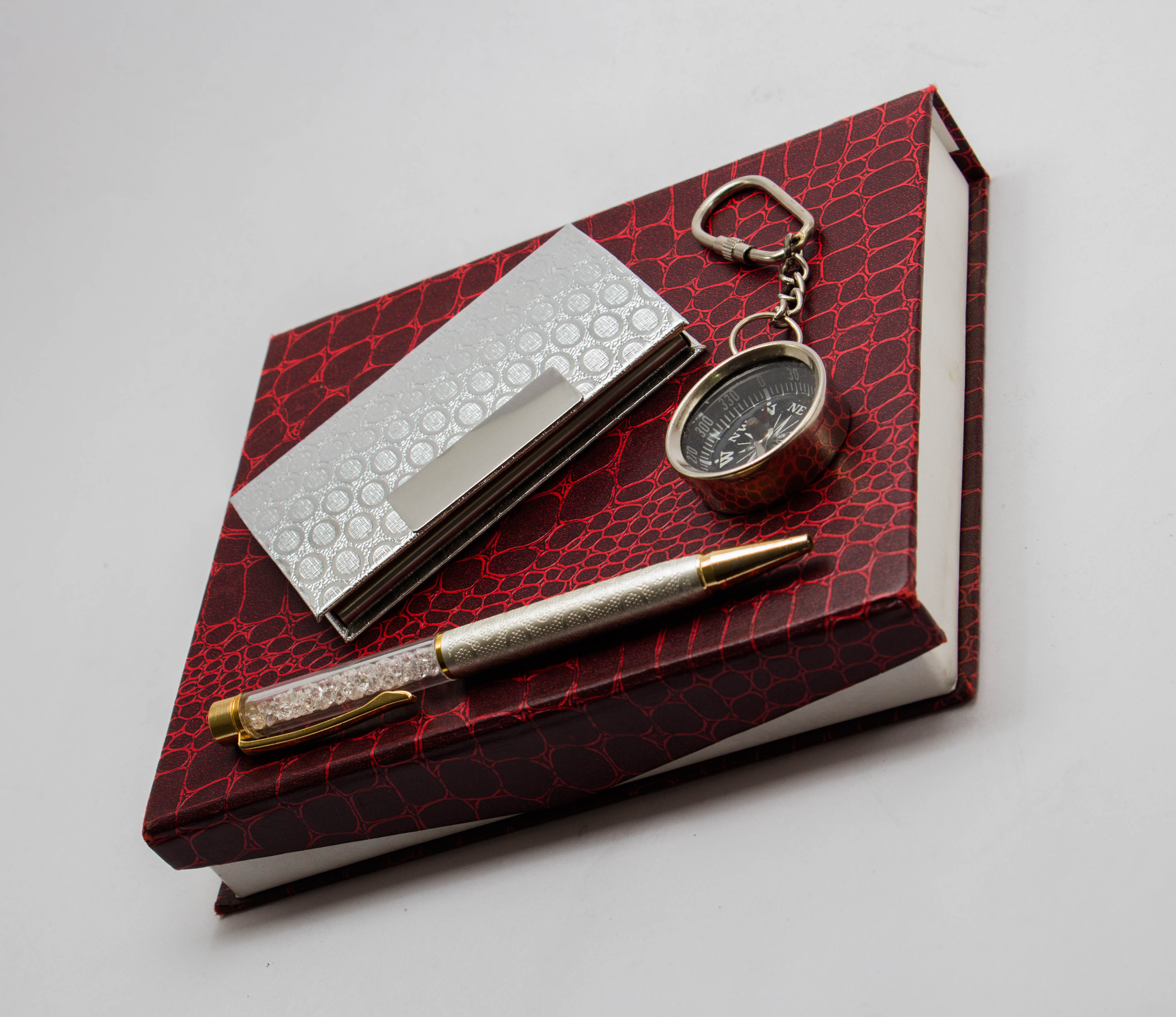 Corporate Gift Item Pen , Card Holder and Compass are made by the hands of the Expert Artisan from Jaipur with Quality Finishing which is use for decor as well as use for gift purposes , corporate gift , Personalized gift , Promotional gift .
PRODUCT SPECIFICATION:
*Material-Paper and Metal
*Color-red , silver and golden color
*Application-use for gift purposes , corporate gift , Personalized gift , Promotional gift .