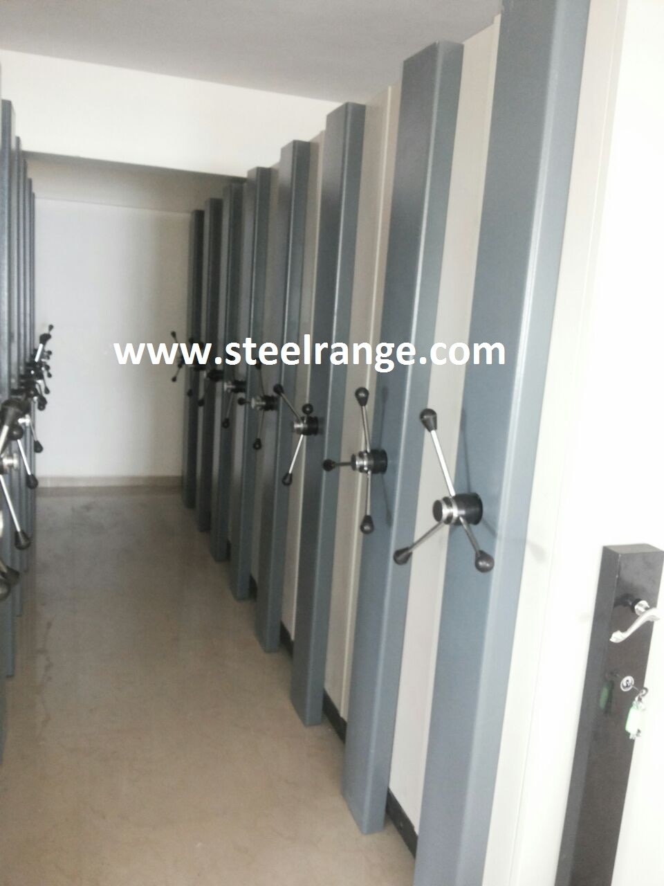 These compactor is manufactured using the latest techniques under the stern vigilance of our deft professionals. Compactor Storage System is provides a solution to your storage needs and increase storage efficiency with a systematic filing and retrieval of storage materials. Compactor Storage System comprises of movable bays resting on rails, the bays are solidly constructed to withstand heavy-duty usage and handling. The storage bays can easily slide from one end to another to retrieve materials and files. This compactor is extensively used at offices, departments and other allied places for storing record files and documents.