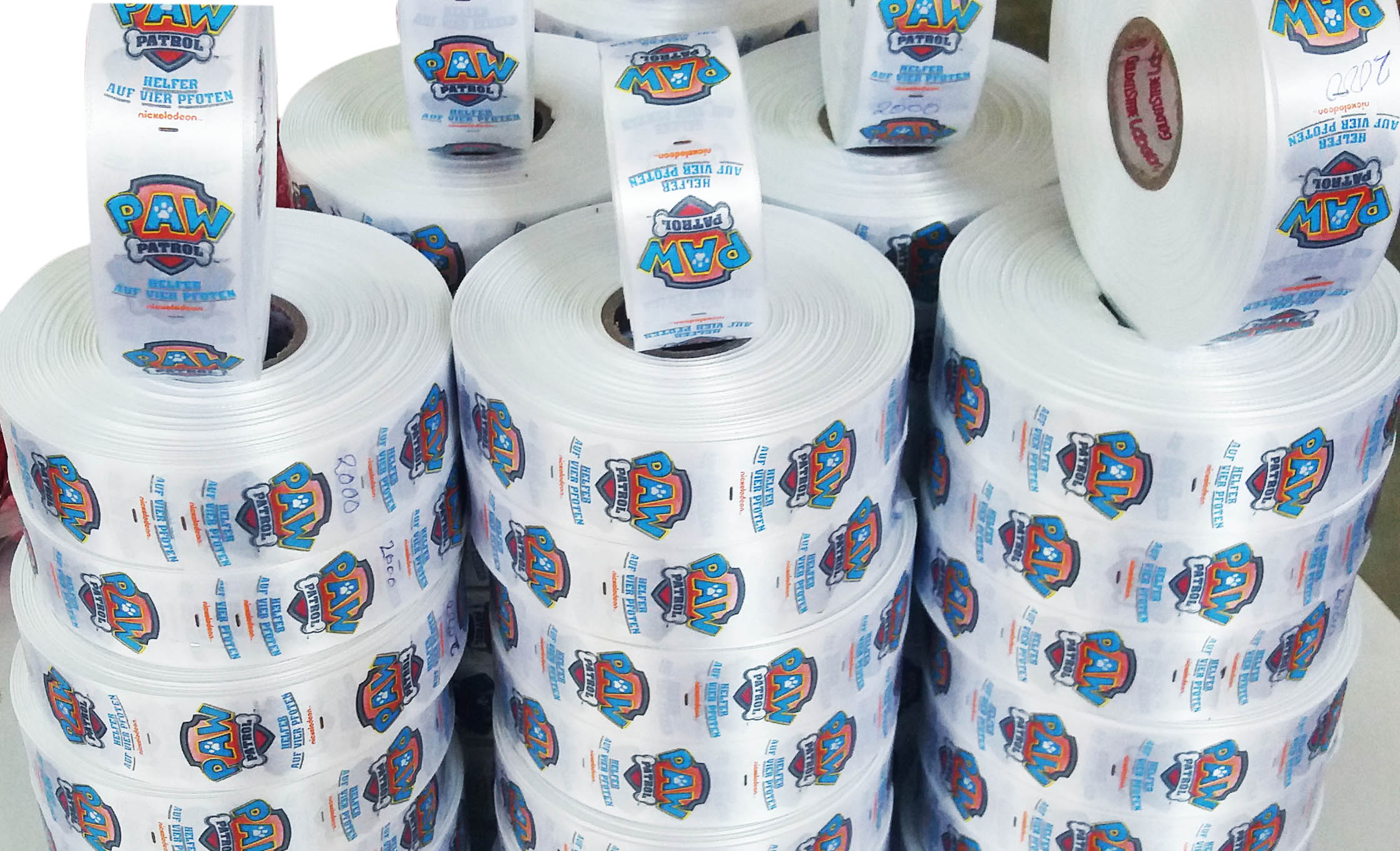 We at Sree Jayam Label locted at 94(A) Arugombai Street, Tiruppur, specialize in Manufacturng Multicolour Printed Labels and Woven Labels, with imported machineries. This label Paw Patrol is printed on Satin Tape using our Rotary Label Printing Machine, which can print 6 colours on the Front and 2 colours on the Reverse. The size of Satin Printed Label is 35 mm x 2 inch. The minimum Order for this Multicolour Printed Label is 2000