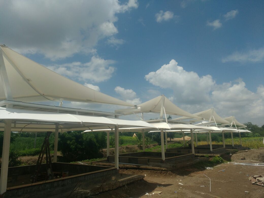 Tensile Structure Car Parking Shade
Tensile structures are architecturally innovative forms of construction art that provide designers and end users a variety of aesthetic free-form canopy designs. Custom-made tension fabric structures are engineered and fabricated to meet worldwide structural, flame retardant, weather proofing and natural forces requirements. The Tension Structure provides elegant solutions for architects, designers, general contractors and anyone who is looking to spice up the ambience of their environment. Stand out from the crowd. Give an Awning to your Shop, Restaurant or any other commercial site. An awning means more attraction, more visits and more sales.Awnings provide your place that extra advantage of show casing your taste & quality even before a potential customer enters your place, it would reflect your commitment to quality and of having a Unique identity. Features Weather resistance Abrasion & corrosion resistance Easy to install Low maintenance Cost-effective