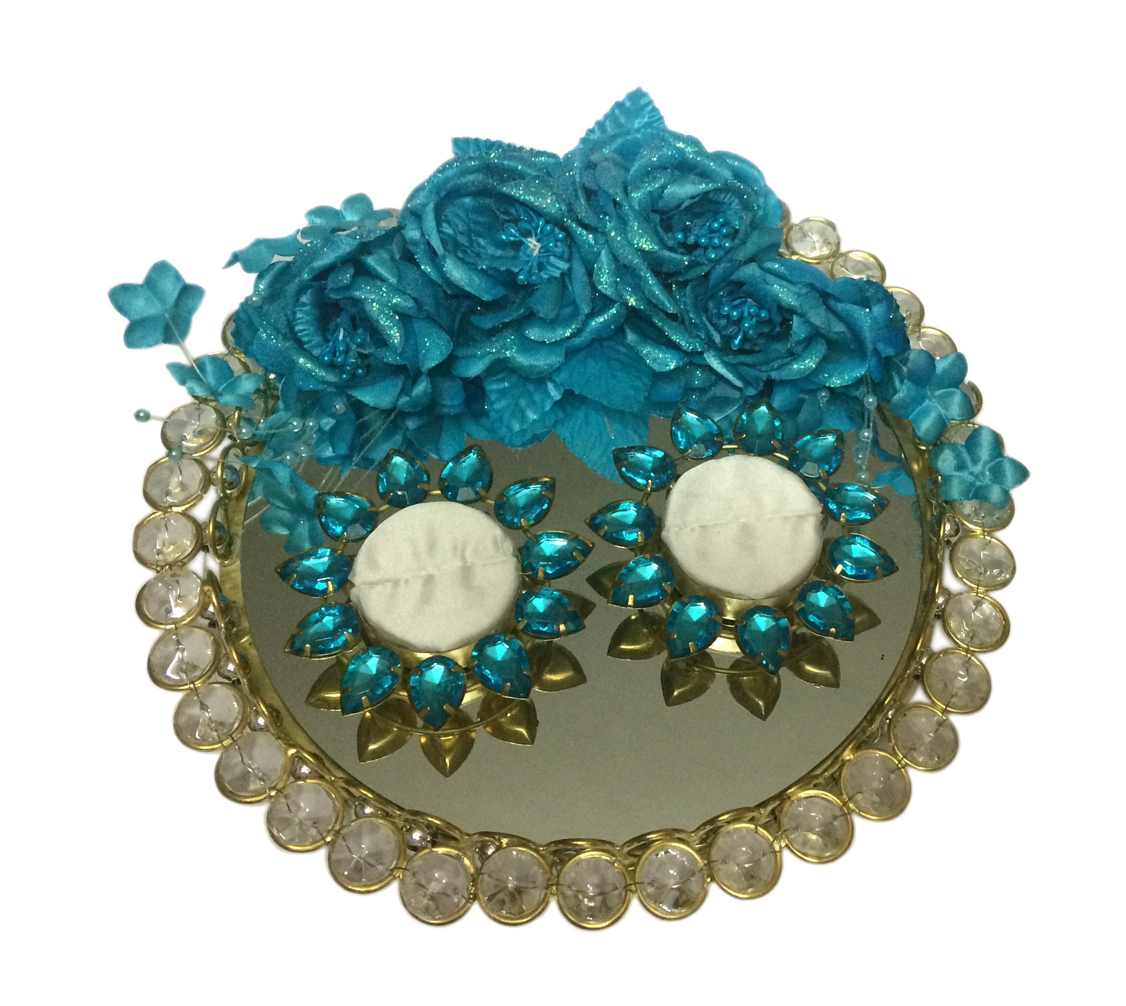 Platter Size”8″ Diameter approx.
Platter Size: 8″X8″ X1″.
Material: Metal,Glass,Fabric.Colour: Blue & Gold.
Purpose: Wedding/Engagement Ring display .
Disclaimer:This product is hand crafted hence may be non-uniform & slightly vary in colour ,texture , placement of holders & size.
Care:Avoid its contact with water & perfumes & chemicals to retain its enamel & polish .