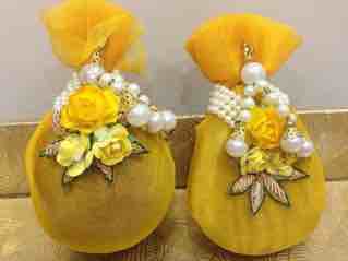 Made by wooden overlapping by cloth with beads work