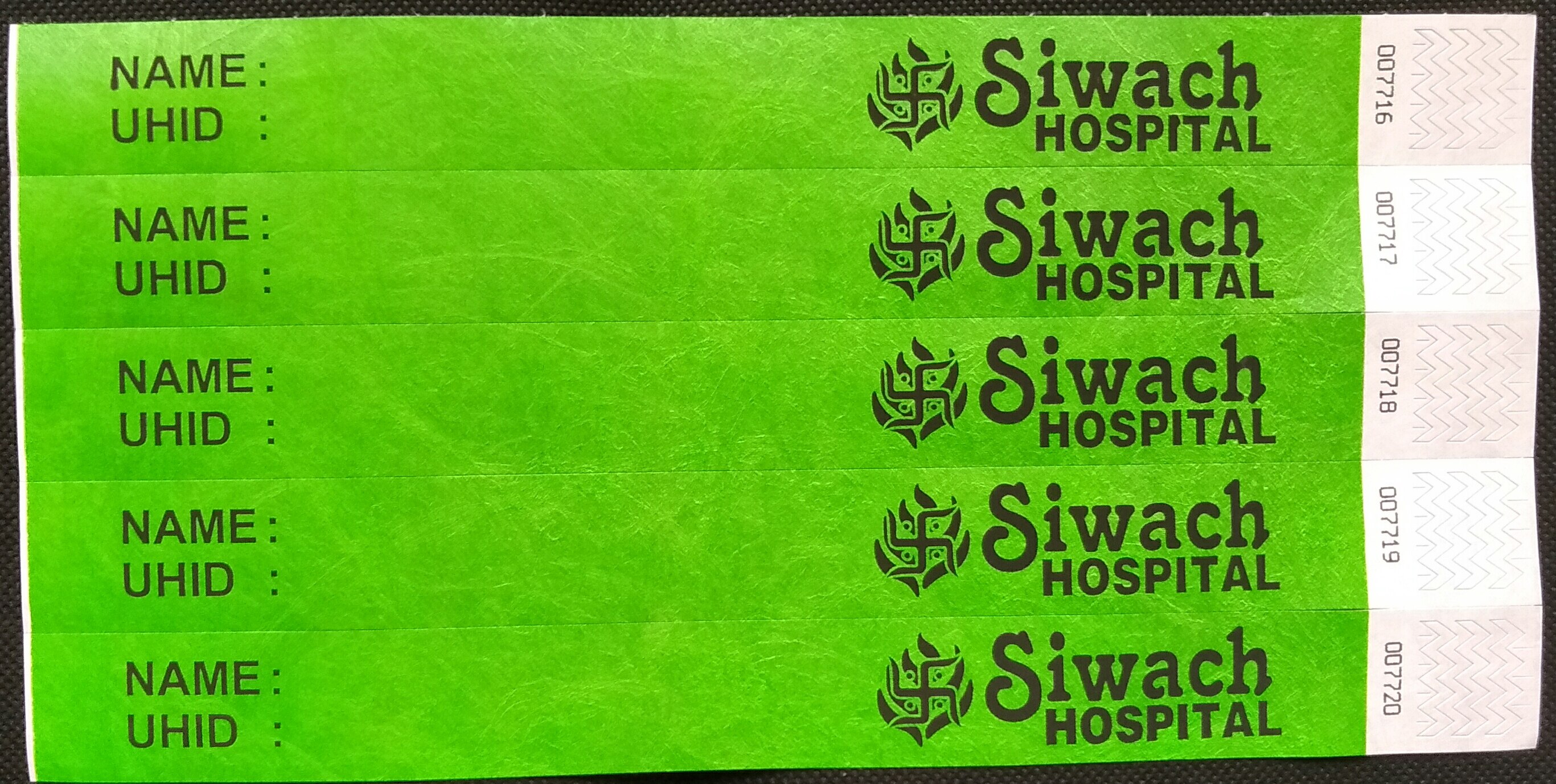 Paper wristbands are often giv