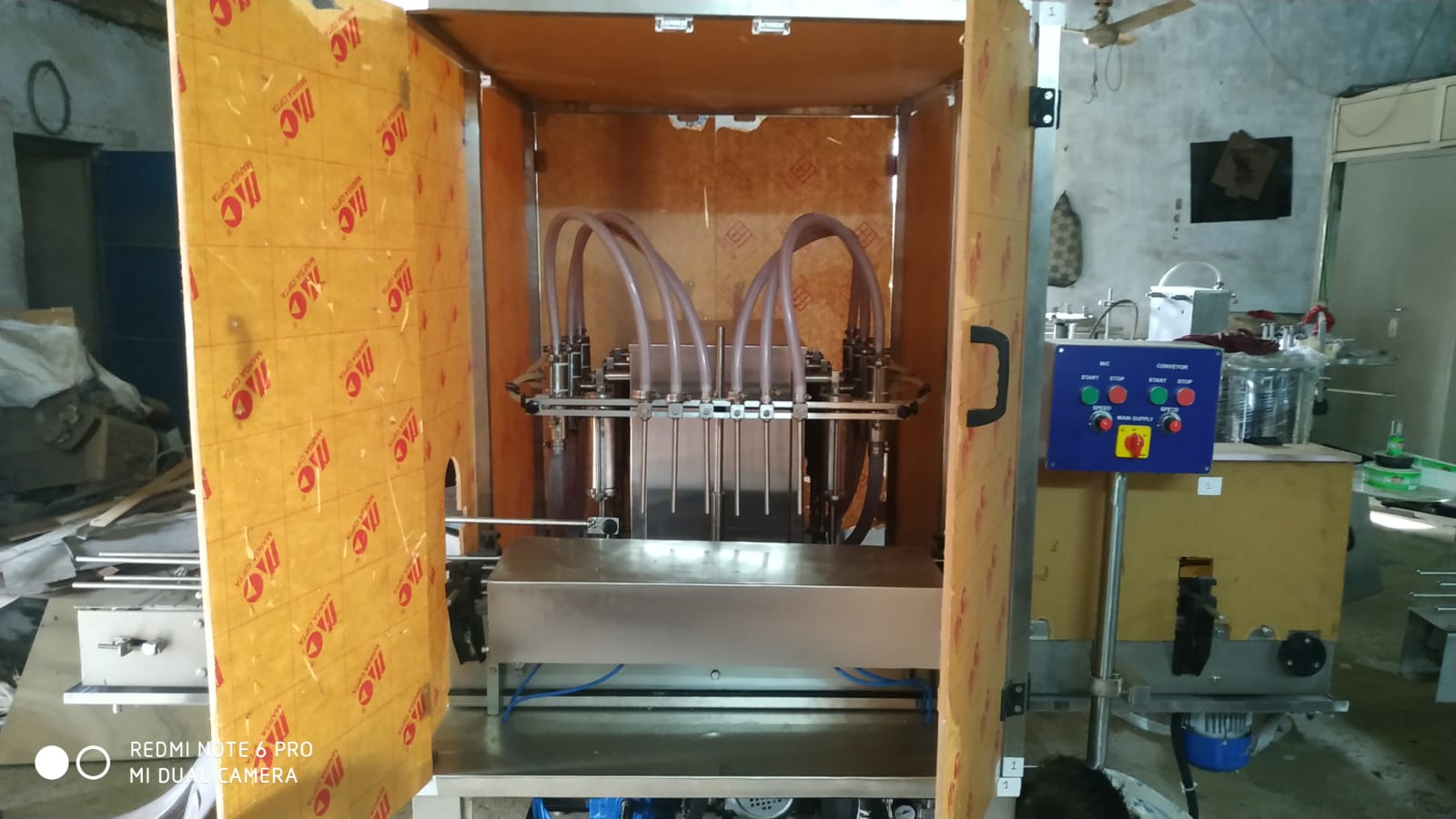 Automatic Multi head Volumetric liquid filling machine image 1
