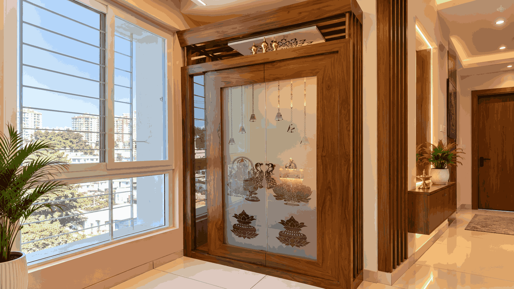 Traditional Wooden Pooja Room Design with Etched Glass Doors and Hanging Bells | Tambaram image 1