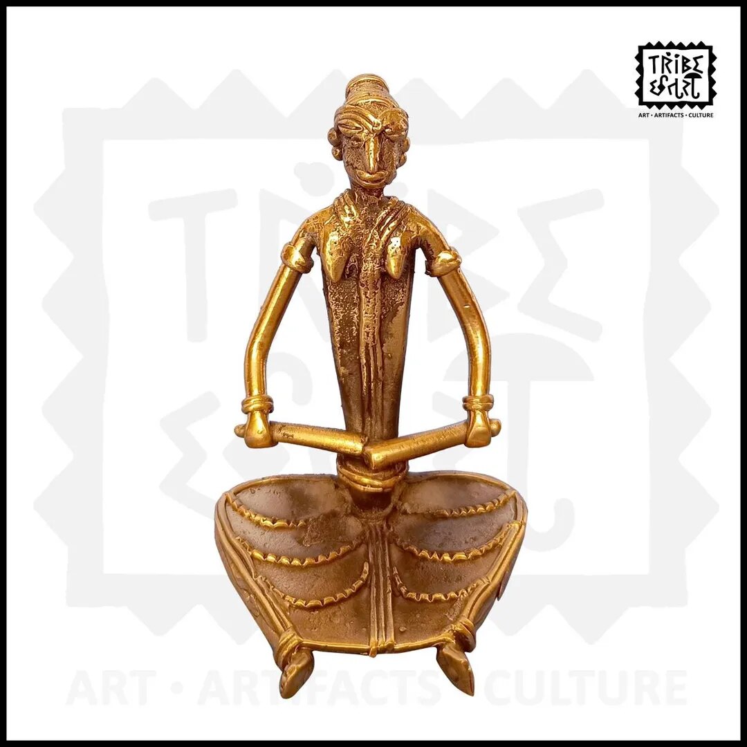 Dhokra Female musician playing drum image 1
