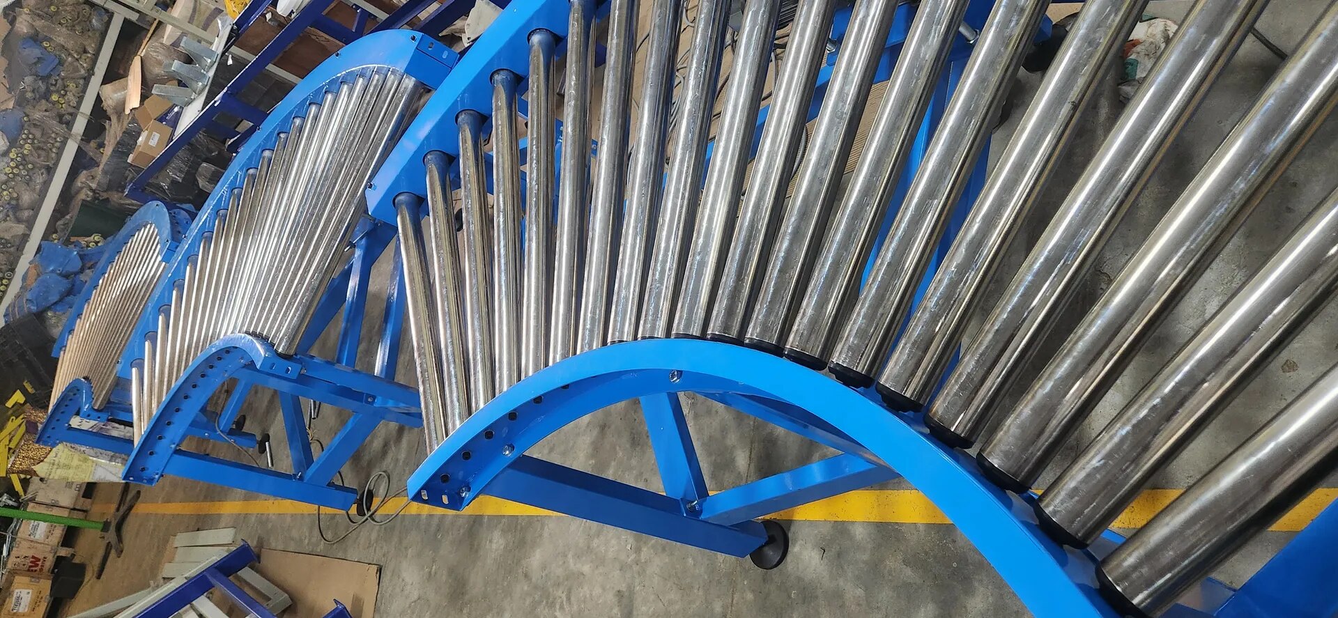 SS 90 DEGRRE POWERED ROLLER CONVEYOR image 1
