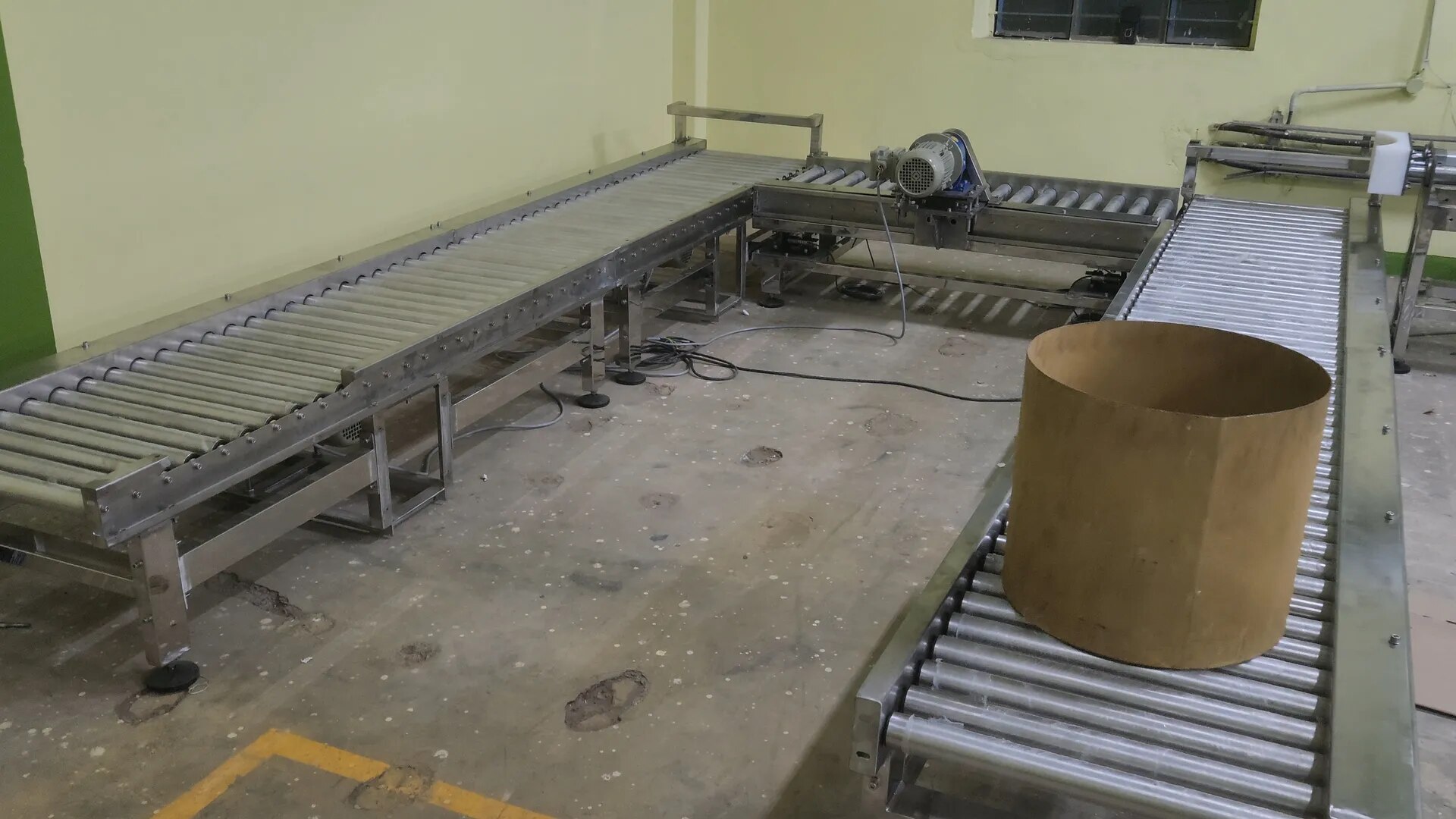 SS POWERED ROLLER CONVEYOR WITH PUSHER image 1