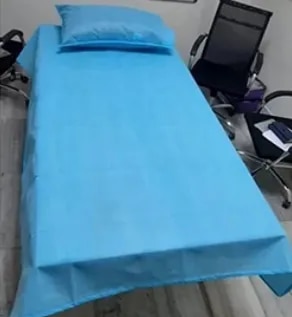 NON WOVEN BED SHEET AND PILLOW COVER image 1