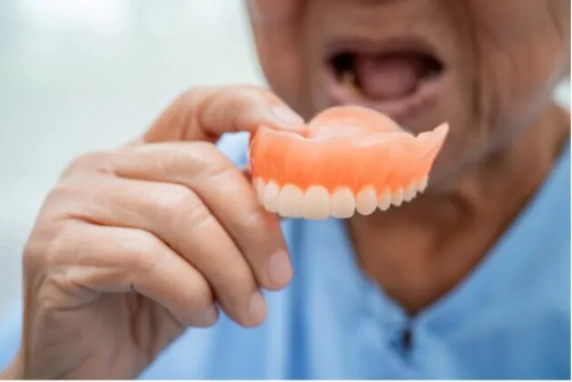 Restore Your Smile with Comfortable, Natural-Looking Complete Dentures image 1