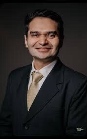 Dr Aman Bhimani