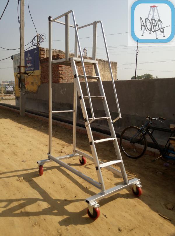 HD ALUMINIUM TROLLY STEP LADDER AQPC MODEL No: 1004 “AQPC” Hevay duty aluminium trolly ladder made of M.S.Tube frame and with strong Aluminium 66mm x 31mm x 3mm and reiling both side wide steps of size 8”x24” {200x600} hold on Two parallel Aluminium “C” Ladder Sections on both side fitted with 2 swivelling and 2 fixed for easy carry, Step to Step Distance : 12” (300mm). AVAILABLE IN ALL SIZE FROM 3ft TO 15ft
