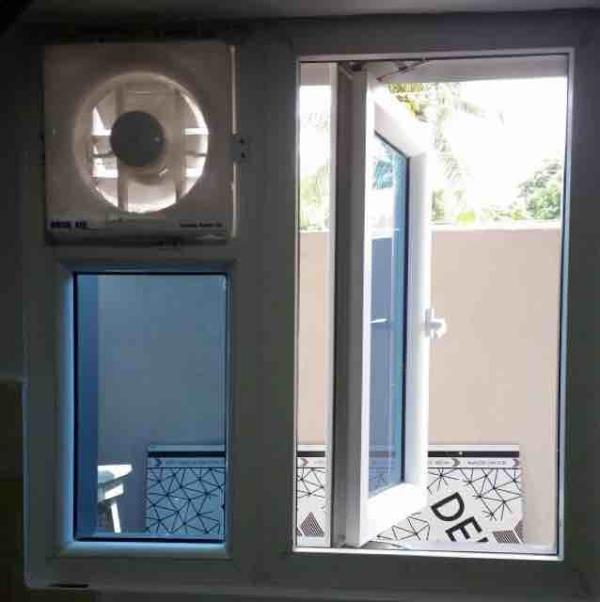 Designer kitchen window with exhaust provision