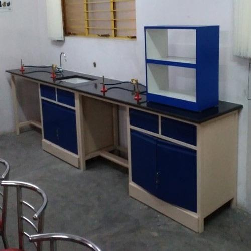 Backed by a diligent team of professionals, we have been able to manufacture, supply and trade Laboratory Table with Sink. Offered table comes with reagent racks above the table & with necessary connections such as gas connection, water connection, drainage connection. Our provided table is thoroughly checked on different parameters to deliver a defect free range. We offer this table at competitive price to our esteemed clients. Features: • Easy installation • Longer service life • High strength
