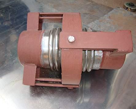 THE GIMBAL RESTRAINT IS DESIGNED TO ABSORB SYSTEM PRESSURE THRUST AND TORSION TWIST WHILE ALLOWING ANGULAR MOVEMENT IN ANY PLANE. GIMBAL ASSEMBLIES, WHEN USED IN PAIRS OR WITH A SINGLE HINGED UNIT, HAVE THE ADVANTAGE OF ABSORBING MOVEMENTS IN MULTI PLANER PIPING SYSTEMS. THE GIMBAL WORKS THE SAME AS AN AUTOMOBILE'S UNIVERSAL DRIVE SHAFT.STARFLEX BELLOWS IS A LEADING SUPPLIER OF GIMBAL BELLOWS IN VADODARA, RAJKOT, SURAT, VAPI, GUJARAT, INDIA