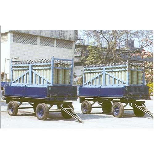 A battery of cylinders mounted on a trolley with wheels that can be transported and used where the consumption of the gas is more. These mounted cylinders are interconnected with individual isolated valves with pressure gauge. This product will immensely help in saving transportation cost and cylinder handling.