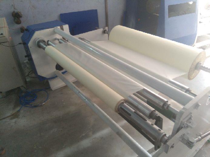 Use in masking tape , bopp tape, foam tape , tarpolin tape & many tapes log making, 5 hp power consumption, fully pneumatic & automatic, rewind & unwind both side pressure roll attachment, rewind shaft air shaft, unwind shaft mechanical, unwind tension mechanical