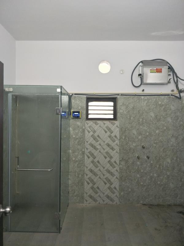 A steam room is an enclosed space with large amounts of high-temperature steam, creating a high-humidity environment. People sit in this room in a similar way to a sauna (conversely a hot, but dry atmosphere), for relaxation and purported benefits to health and well-being. They can be commonly found in gyms, sanitariums and health resorts. Smaller, standalone steamroom enclosures can also be found in residential buildings.Steam rooms are at a temperature of 41 degrees[1] Celsius (105 Fahrenheit) or above, with a high humidity of around 100% adding to the sensation. In comparison, saunas are maintained at a much higher temperature due to the lack of humidity in the air (often 70–90 degrees Celsius, 158–194 Fahrenheit).The amount of power required for steam generation varies depending on construction style.Contact: Sunspa Solutions+91-9849756469,+91-9966999886