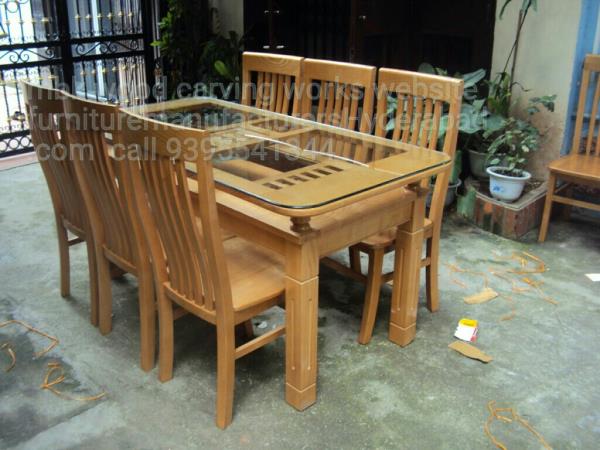 Teakwood dining table set number of wooden chair 6 number one big dening tebal new model dining set nice model and new look dining with polish chair top full wood no cushion with glass Top dining polish colour natural and other color as per customer required this model only on order for ready no is stock time 10 to 15 days