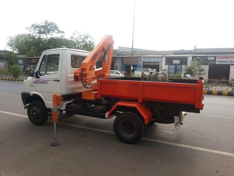 Attachment mounted behind the cabin of the truck. Articulated and Telescopic type of the booms is used to handle the material. Very Compact design, which gets folded behind the truck. Very useful were there is labour problems.