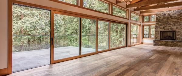 Lift & Slide custom door systems are a popular choice for opening up large expanses. A system of levers and wheels lifts the panel off the sill enabling movement of large, heavy panels with very little effort. A door weighing up to 880 pounds can be opened with ease.Features & BenefitsLevers and wheels lift the panels off the sill, freeing it from weather stripping with very little effortSill-supported panels run on two multi-wheel carriagesResistant to air and water infiltrationDual weather seals at the top, bottom and sidesPocketing and cornering systems availableNon-corrosive multi point locking hardwareMotorized operation available