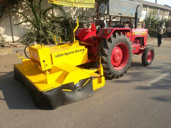 Tractor Drawn Sweeper machine is useful for cleaning streets. Mechanical Sweeper which has a main broom at the center which collects the dust in the collection box.The mechanical sweeper has no limitations and collects leaves, paper, metal cans and even gravels.Power required is taken from Tractor's PTO shaft at Rear.Sweeping Width: 1800mm Centre Brush Material: Steel Wire Brush.Brush Diameter: 450 mmDust Collection Box Capacity: 0.16 CUMMaterial: 3 mm MS materialCaster Wheels: At rear for setting according to brush contact on the road.Paint: Two Coat of Zinc Primer            Two Coat of Synthetic enamel.