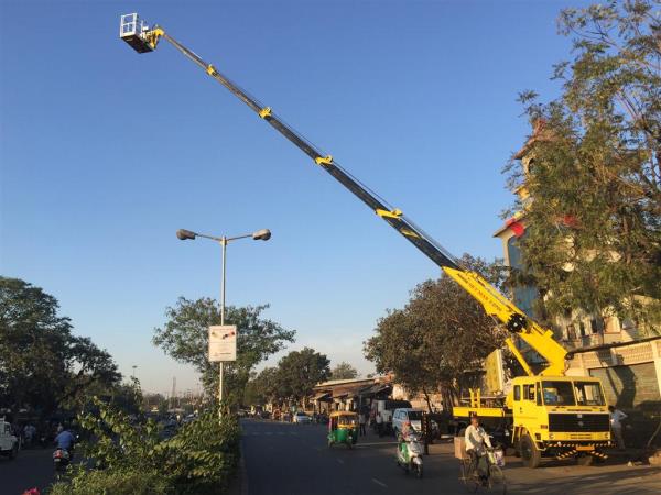 Aerial Work Platforms were developed for maintenance purpose. These platforms have both vertical height as well as horizontal outreach. Platforms are available from 9.5-meter working height to 42 meters working height. These platforms can be mounted on the 1-ton chassis to 25-ton chassis. All the platforms are made looking at the safety of the person. The platforms are designed as per EN280 standard. 3kV insulated bucket is provided for electrical maintenance purpose.Telescopic Platforms are available from Height of 20 meters to 42 meters working height.SpecificationWorking Height: 11, 15, 17, 20, 25, 27, 30, 35, 42 metersWorking Outreach: 5.5, 6.5, 9, 10, 16 metersSlewing: 360 degreesSafe Load: 200 kgsCage Type: FRP / Aluminum Cage size: 1.0 X 1.06 X .77 mBooms: From High Tensile Steel.Stabilisers: 4 Nos.hydraulic extendableLeveling: Hydraulic LevelingControls: Dual Controls. Basket and BaseEmergency Hand Pump in case of Power Failure.Wireless remote control (Optional)Slewing restriction interlockBoom to Stabilisers interlockTurn over prevention interlockVehicle Auto Levelling (Optional)Digital cage load display system (Optional)