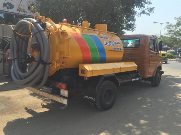 MANIAR ‘GullyMan’ is an advanced technology with a blow-back system for cleaning cesspit, cesspool and manhole chambers. This Machine is capable of creating a very high degree of air pressure which breaks the silt sedimentation that gets accumulated at the bottom of the cesspit, cesspool and manhole chambers. It is equipped with major IMPORTED components including its unique heavy duty Vacuum Pump. It is capable of sucking particles up to 40 to 50mm dia along with sludge from a distance of 100 feet and depth up to 25 feet. The tank can be tilted (optional) at a specified angle and the hinged type rear door can be opened and closed hydraulically to drain out the collected liquid waste or silt. Utmost care has been taken to install adequate safety devices such as Auto shut-off valves, Imported Siphon filter, Safety pressure release valve, Quick release coupling are few safety features among those safety instruments, which ensure that the equipment operates with safety & avoid chances of occurrences of an accident.Vehicle: TATA, Eicher, Ashok Leyland. 7 Tonner VehicleSludge Tank Capacity:  4000Material: Mild Steel of 5 mm thicknessSuction Pump: Imported Italian makeCapacity: 390 m3/h Power for Vacuum Pump: Is taken from Side PTO / Split shaft PTO.Suction Hose dia: 3