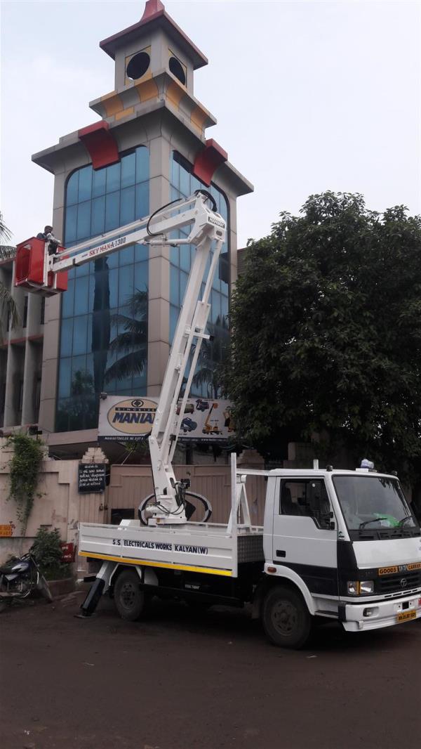Aerial Work Platforms were developed for maintenance purpose. These platforms have both vertical height as well as horizontal outreach. Platforms are available from 9.5-meter working height to 42 meters working height. These platforms can be mounted on the 1-ton chassis to 25-ton chassis. All the platforms are made looking at the safety of the person. The platforms are designed as per EN280 standard. 3kV insulated bucket is provided for electrical maintenance purpose.Platforms are available in articulated, articulated cum telescopic and telescopic platform. In our equipment the bucket is close to the vehicle floor, hence the step in is easy and no sequence is required.Vehicle: 4 Tonner, 3100 wheelbaseWorking Height: 13 metersWorking Outreach: 5 metersSlewing range: 360 degreesSafe Working Loads:  200 kg Cage Size:  1 X 1.06 X 0.77 meterStructure: Hexagonal Booms from High Tensile SteelStabilisers: 2 Nos. / 4Nos.  designed as per the vehicle.Bucket Levelling: Mechanical LevellingControls: Dual Controls. Bucket as well as the base.Emergency Pump: Emergency hand pump is provided in case of power failure.FEATURES:1) No Sequence required to operate the Boom.2) Low Bucket Height. Direct Entry into the bucket. No operation required to enter into the bucket.3) No Rotation unless and untill the platform is raised. To prevent boom from getting damaged4) Light Weight Design.