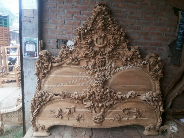 King size double beds 6 feet height board front board 2.5 feet height mattress size 6.25 length 6 width best hand carving design rose flowers design polish natural color height board cushion side pise 6 Inches 2 side box this bed without storeg in side storeg possible start to order discuss then this model fully work to hand no mashen first order time to work completely 30 days