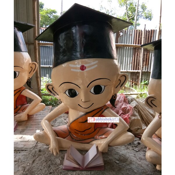 Pandit Cartoon Statue