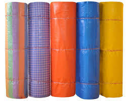 HDPE tarpaulins are made from premium quality woven HDPE fabric laminated with LDPE on both sides. There are various qualities and thicknesses available which are made using multiple layers of HDPE sandwiched between layers of LDPE on the outside. These types of tarpaulins are very rugged and are most suited for applications where there is a great deal of wear and tear.FeaturesAll products are made from virgin polyethyleneHigh tensile strength and puncture resistanceLight weight hence ease of handlingOutstanding flexibility hence suited to cover irregular shapesTough and durableHeat sealed hemmings with strong joints; no stichesProtective UV stabilized on both sides and hence lasts longer even in sunny outdoorsFire retardantResistant to Stains Acids, Dyes and most Chemicals100% waterproof, leak proof, weatherproof, oil proof and rot proofEasily repairable and cost-effectiveStrong aluminum passivity eyelets – hook fixed100% recyclable; environment-friendly