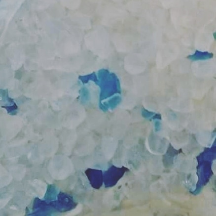 AQUABLUE | Silica Gel Products Cat Litter Silica GelCat Litter Silica GelCat Litter Silica GelWe are manufacturer of Cat Litter Silica Gel. Our Crystallized cat litters are mixture of white and blue silica gel which has low bulk density less than 500 gm/m3 which can absorb 100% litter of its weight. This gel is absorbent and also provides odor control. The silica gel use in these products is similar to the desiccant that is often found in the pouches packaged as a preservative with foods, medications, and other consumables that can be damaged by excess moisture. Silica-based cat litters provide an option for those who prefer a non-clay litter. They tend to produce less dust than clay litters.