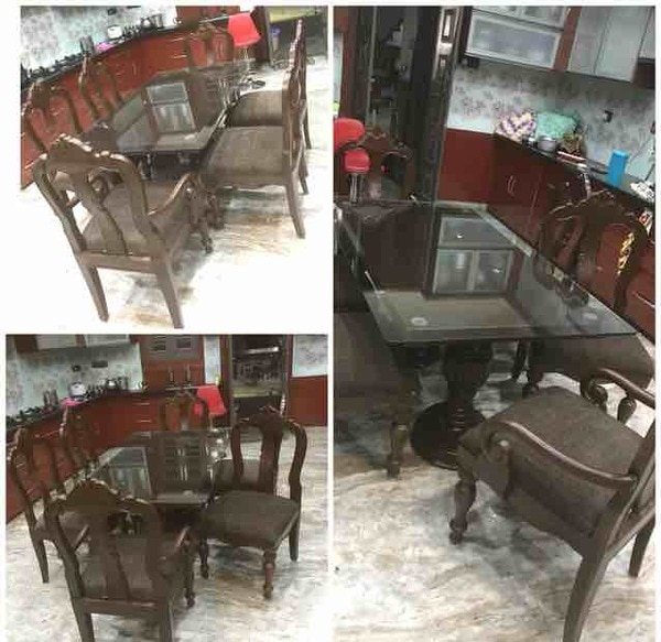 Teakwood dining table set light carving design good looking chair and dining with 6chair one dining table 2 chair with hand resting 4chair without hand resting dining top with glass 12mm chair size 19 inches by 20 inches sheeting area back height 45 inches and best fabric and branded clothing dining leg 8 inches by 8 inches with carving design normally height bottoms to top