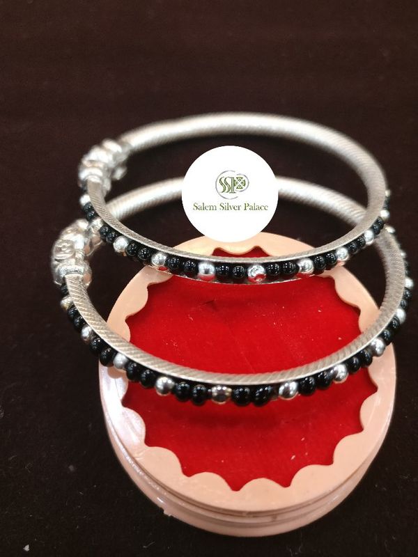 Black beads baby bangle. Available in red colour also. For wholesale and retail orders contact us.
