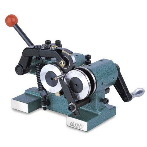 Punch Grinder is a tool which can be put on the surface of grinding machine for grinding punches. It can do cylindrical grinding automatically. * The roller can be used to adjust the workpiece before grinding. * Use screw pressure for firm holding as shown in the picture for heavy grinding. * Accuracy of roller is within 0.005mm. It can grind punches of outside diameter from 1.5 to 25mm, extended grinding length is within 5~35mm