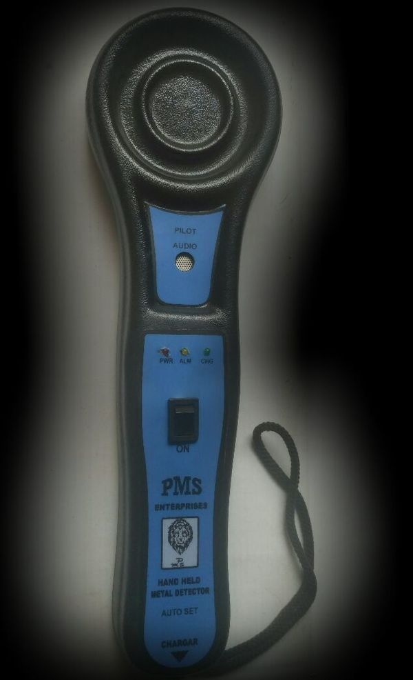 HAND HELD METAL DETECTORMetal Detector for Security & pilferage Prevention application including airport, prisons, customs, banks, police department, courtrooms, Public buildings, and industry etc. PX-005 is our new ultra sensitivity detector with a target size down to 0.1gm. PX-005 Hand Held Metal Detector is light weight, rugged detector for locating hidden metal object on a person. Gives an idea for quantity of metal detection”.Features:• Auto Set , does not require adjustment • Detects weapons, ferrous & non-ferrous metals, conductive metal alloys & ferrite • Light Weight • Audio & Visual alarm on metal detection. • Power ON, Metal detection and battery Charging indication • Operates on single 9 Volt battery • Built-in battery Charger • High impact ABS light weight body with removable cover for replacement of battery • Ultra low power consumption • Easy to use. One switch operation • Long battery life • Comfortable handle and Wrist strap for holding Technical Specification:- Dimensions :- 410 x 140 mm approx. Weight :- 280 grams approx: Sensitivity: O.1 gram of metal from 20-25 mm distance.Dimension: 335X100 MMWeight: 300 gram s Battery: 1 X 9 Volt re- chargeable/ dry / alkaline battery.Temperature: 0 to 50 degree C. Humidity: 90% Rh
