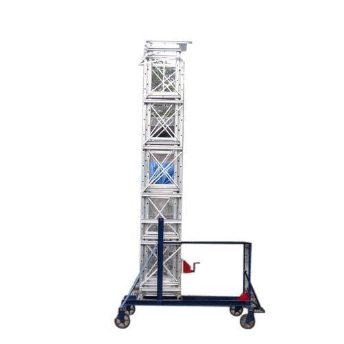 Aluminium Til Table Tower LadderManufactured from high tensile aluminum alloy. Factory star is designed to suit low passages and overhead obstruction as the star- structure can be tilted in to horizontal positions. Platform fitted with guard rails, tool tray, M.S. Trolley base with a pair of fix wheels and swivel castore, pendulum looks, rope, pulley, safety stoppers etc. In 3 section fitted with hand operated winch gear machine.Sides:Channel Section2 5/8