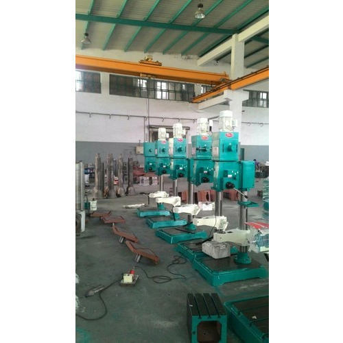 Our product range includes a wide range of column pillar drilling machine, fine feed pillar drill machine, automatic fine feed pillar drill machine, pillar drill machine, geared pillar drill machine and auto feed column drilling machine.Minimum Order Quantity : 1 UnitDrilling in MS : 40 mmDrilling in CI : 45 mmTapping in MS : 25 mmRough Boring in MS : 75 mmSpindle Travel : 250 mmSpindle Speeds : 70-1225 x 9 (RPM X steps)Diameter of RAM : 78 mmAutofeed Ranges : 0.05 & 0.09 (mm/rev.)Max Dist Spindle nose to Table : 575 mmSpindle center to column : 345 mmMachine Mesurement : 1510x850x2100 (LxBxH)Diameter of Column : 130 mmDist from Spindle Nose to Base : 920 mmWork Table : 450 x 455 mmDrill Head Motor : 1.5 HP/960 RPMAutomation Grade : AutomaticDrilling Diameter (in mm) : 6 mmSpindle Hole Taper : MT -4Drill Depth(mm) : 10-20No Load Speed : 0-500 rpmBrand : PrakashOil bath Gear Box:The all-new design of gearbox in model PMW- R40AA, R40G and P40AA is having 9 speed with all 9 gear made up of hardened NiCr steel up to HRC 50- 55. Oil bath gearbox and hardened gears give very long life to the machine. Rotation and easy sliding of gears in bearings give very high reliability. Gear is internally six splined and shaft are externally splined All the gears in the gearbox are machined on imported WMW Germany make gear shaper. All the splines in the gearbox are machined on imported faster Germany make spline milling machine. Autofeed Gear Box:Autofeed gearbox used in Machine R40AA, R40BA & P40AA is having gears made up of NiCr Steel with heavy 2.5 module. All gears are also hardened. Two worm gears are made up of heavy duty 2.82 module teeth. All the shafts in the Gear Box are supported through good quality bearings and not the Bushes. Engaging of Autofeed through Taper Cone Mechanism as in the lathe machines enables maximum loading capacity leaving behind other machines.