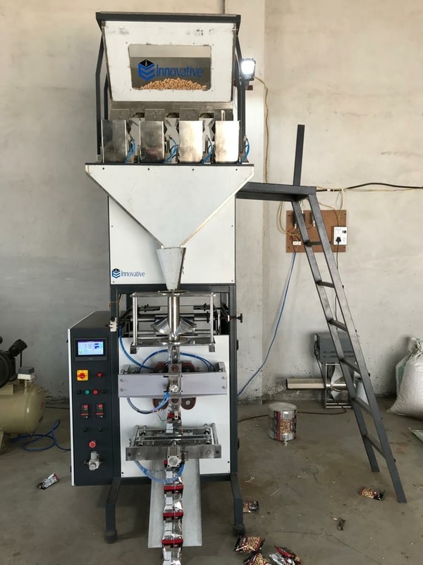 We are manufacturer of chuna parcel pouch packing machine