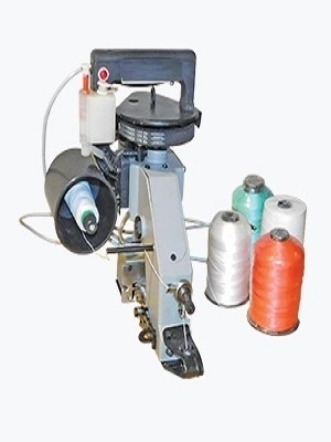 DA is a single-thread chain-stitch portable filled bags closing sewing machine. This robust machine stands up to the most demanding sewing jobs on all types of paper, textile and poly bags made from HDPE/PP, etc. It is simple to operate, even for inexperienced users. The reinforced feed mechanism consisting of wider presser foot and feed dog with a bigger throat plate than conventional single thread chain-stitch bag closing machines helps achieve smoother, even and better looking plain and folded top closures.