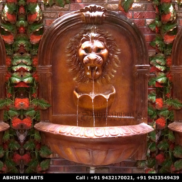 Lion face wall fountain