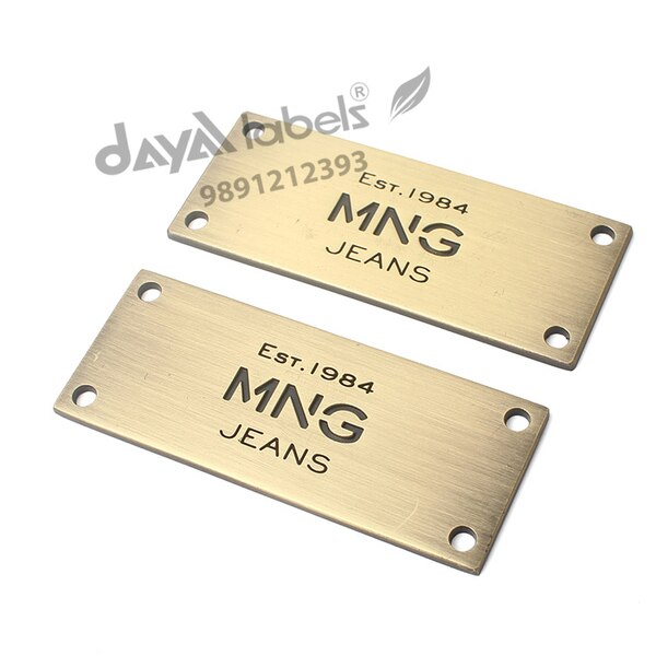 The specialty of our organization lies in the offering of Metal Labels. One could easily deduce from their name that these Metal Labels are mainly designed by using best quality metal and other material. Uniquely formulated, these Metal Labels are highly durable and sturdy in their construction. Finally, these labels are widely used in the garment industry.