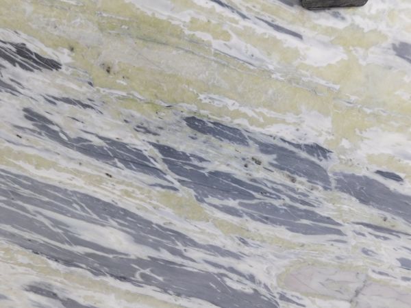 Galaxy Onyx Marble is one of the most sought after products by architects. This marble given a marvelous effect when subjected to light from Back. And accordingly this Onyx is mostly used in Big Hotel Projects, Renowned Dining Restaurants, Bars and exemplary residential projects. Details are as below:Nature: OnyxOrigin: Rajasthan, IndiaColor and Texture: Cream Base with Blue Thick Veins moving through the green Onyx region. Availability: Slabs, Tiles & BlocksFinished: Polished & BrushedSizes: As per order